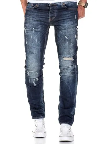 REPUBLIX Herren Regular Straight Fit Destroyed Jeans R7500 Dunkelblau W36/L32 - Modische Herrenjeans in Dunkelblau mit regulärem Schnitt für bequemen Sitz. Robuste Verarbeitung aus 98% Baumwolle sorgt für Flexibilität. Ideal für lässige Outfits und den täglichen Einsatz.