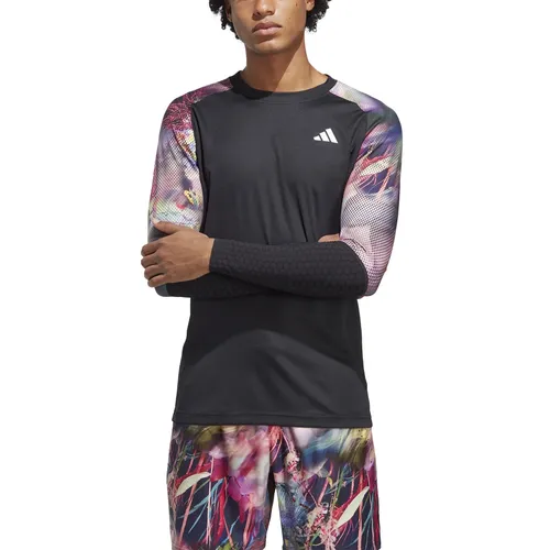 adidas Performance Langarmshirt Melbourne Tennis Heat.Rdy für Herren - Sportliches Langarmshirt für Tennis mit innovativer HEAT.RDY Technologie für kühlen Komfort. Das FreeLift Design sorgt für rutschsicheren Sitz und unterstützt die Muskeln bei jedem Schlag.