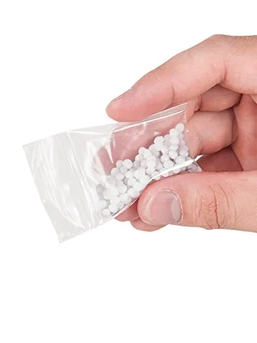 Haftperlen für Vampir-Zähne - Halloween Kostüm-Zubehör - Kostümzubehör & Accessoires für Kinder, ideal für gruselige Halloween-Verkleidungen mit perfekten Spezialeffekt-Zähnen.