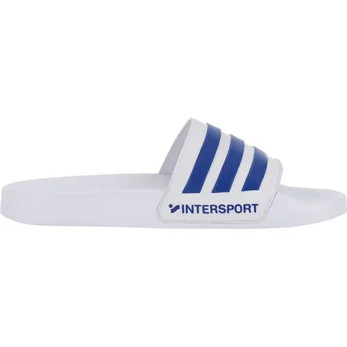 ADIDAS Herren Badeslipper Shower adilette – Komfortabel und Stilvoll - Ideal für Schwimmbad, Umkleide oder Zuhause. Diese adilette bietet hervorragenden Komfort, ist leicht und dämpft jeden Schritt. Mit adidas Logo und 3-Streifen für einen sportlichen Look.