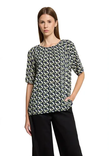 Schlupfbluse BETTY BARCLAY - Modische Damenbluse mit Rundhalsausschnitt - Damenbluse in Größe 42, figurumspielend und aus 100% Viskose. Der feine Minimal-Druck sorgt für einen modernen Look, perfekt für stilbewusste Freizeitoutfits.