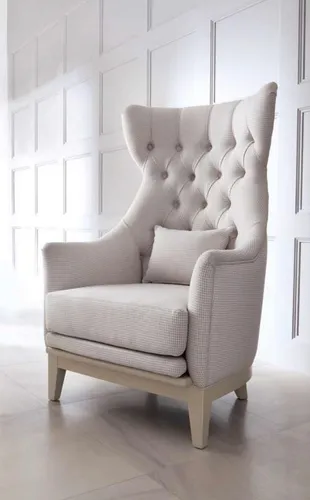 Chesterfield Ohrensessel Luxus Sitzer Beige - Eleganter Ohrensessel im Chesterfield-Stil, ideal für Wohnzimmer oder Arbeitszimmer. Mit hochwertiger Polsterung und robustem Holzgestell für optimalen Komfort und Langlebigkeit.