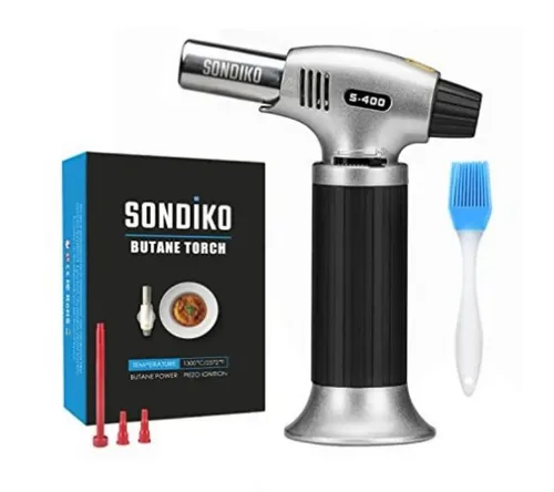 SONDIKO Flambierbrenner Crème Brûlée Bunsenbrenner Grillanzünder Lötbrenner nachfüllbar, (Premium vielseitiger Küchenbrenner, ideal für Küche und Outdoor., Gasbrenner inkl. Silikon-Küchenpinsel, vielseitig), Sicherheitsschloss verhindert versehentliches Zünden