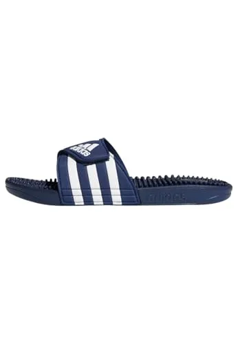 adidas Unisex Adissage Slides - Komfortable Dusch- & Badeschuhe - Ideal für Damen, diese Adissage Slides bieten ein rutschfestes Design und ein Fußbett mit Massagenoppen für ultimativen Komfort nach dem Duschen.