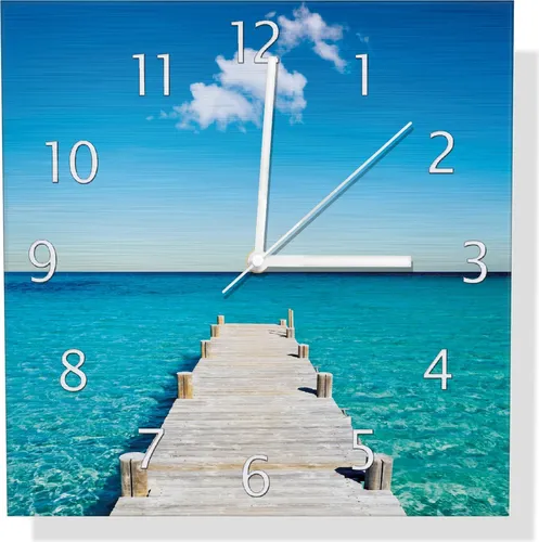 Wallario Design Wanduhr Steg am tropischen Meer - Aluverbund, 30 x 30 cm - Verleihen Sie Ihrem Raum einen Hauch von Eleganz mit dieser stilvollen Wanduhr aus Aluminiumverbund. Leicht, stabil und mit UV-beständiger Tinte bedruckt, ist sie ein echter Blickfang.