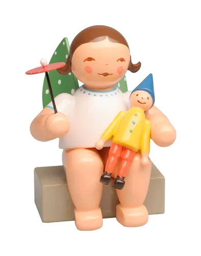 Wendt & Kühn Engel mit Kasper und Schirm, sitzend - Figuren: Handgefertigter Engel, ideal als liebevolles Geschenk oder zur Dekoration für die festliche Jahreszeit.