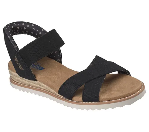 Skechers Slip-Ins Bobs Desert Kiss – Golden Lily Damen Sandale Schwarz - Entdecke die bequemen Slip-Ins Bobs Desert Kiss Damen Sandalen in Schwarz. Mit einem praktischen Fersenkissen und Gummizugriemen für einfachen Einstieg. Hergestellt aus 100% veganen Materialien und maschinenwaschbar.