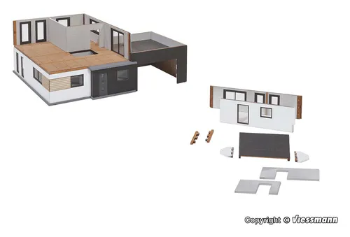 Kibri 38335 H0 Kubushaus Julia im BAU - Detailgetreues Modell eines modernen Kubushauses, perfekt für Ihre Modelleisenbahnlandschaft und ideal für kreative Bauprojekte.