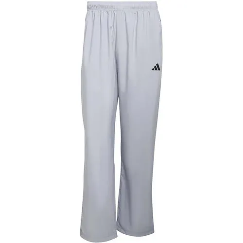 ADIDAS Herren Sporthose WORKOUT ESSENTIALS BASE - Moderne Sporthose für Herren mit verstellbarem Saum und praktischen Reißverschlusstaschen. Ideal für jedes Workout, bietet sie Bewegungsfreiheit und hohen Tragekomfort. Die atmungsaktive Konstruktion sorgt für ein angenehmes Gefühl während des Trainings.