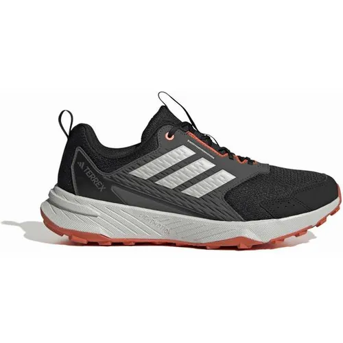 ADIDAS Herren Trailrunningschuhe Tracefinder – Optimaler Halt für Outdoor-Aktivitäten - Ideal für Trailrunning und Wanderungen: Der adidas Terrex Trailrunning-Schuh kombiniert Komfort, Atmungsaktivität und strapazierfähiges Obermaterial für besten Halt. Die griffige Traxion Gummiaußensohle sorgt für sicheren Grip in jedem Terrain.