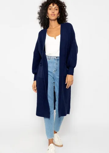 SASSYCLASSY Oversize Cardigan Damen - Eleganter Maxi Cardigan aus Grobstrick mit seitlichen Eingriffstaschen, ideal für kalte Wintertage. Perfekt für einen lässigen, modernen Look.