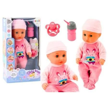 Lean Toys Babypuppe im rosa Pyjama, die in eine Flasche pinkelt (49676505)
