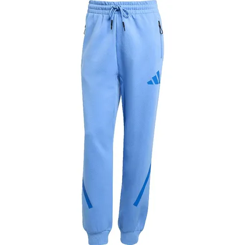 ADIDAS Damen Hose Z.N.E. - Sportlich und nachhaltig - Modische Hosen aus 70% recycelten Materialien, perfekt für Teamgeist und Komfort beim Sport oder Freizeit. Inspirierter Linienprint für einen sportlichen Look.