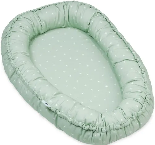 Julius Zöllner Kuschelnest NIDO - Babynest für sicheren und gemütlichen Schlaf, ideal für Neugeborene und sorgt für Geborgenheit im Babyzimmer.