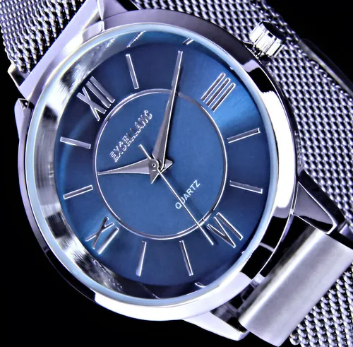 Excellanc Design Damen Armbanduhr Blau Silber - Modische Damenuhr mit elegantem Edelstahl-Meshband und hochwertigem Quarzwerk. Wasserdicht gegen Spritzer, ideal für den Alltag.