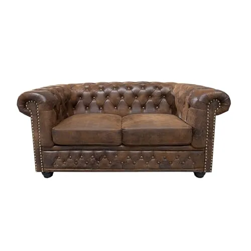 riess-ambiente 2er Sofa CHESTERFIELD - 150cm antik braun - Sofas: Hochwertiges Chesterfield-Sofa mit bequemer Taschenfederkern-Polsterung und edler Knopfheftung für zeitlosen Komfort und Stil.