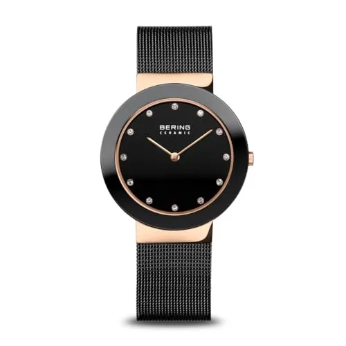 BERING Damen Quarz Uhr 35 mm - Elegante Armbanduhr in Roségold mit Saphirglas - Armbanduhren für Damen mit kratzfestem Saphirglas und 5 ATM Wasserdichtigkeit. Das roségoldene Edelstahlgehäuse und das schwarze Zifferblatt verleihen einen eleganten Look.