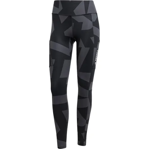 adidas Terrex Multi Printed Tights - Carbon/Black - Damen Outdoor- und Wanderhosen, aus 70% recycelten Materialien für Nachhaltigkeit, mit elastischem Bund und praktischen Seitentaschen für maximalen Komfort beim Wandern und Laufen.