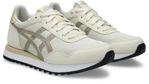 Asics Damen Sneaker TIGER RUNNER II 39EU - Retro-Style Sneaker für Damen mit moderner Note. Die EVA-Foam-Mittelsohle sorgt für optimalen Tragekomfort und Dämpfung, ideal für den täglichen Einsatz.
