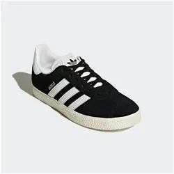 adidas Originals Damen Gazelle Sneaker, Core Black Footwear White Gold Metallic - Damen-Sneaker mit hochwertigem Wildleder-Obermaterial, dämpfender Einlegesohle und Gummiaußensohle für optimalen Komfort und Stil.