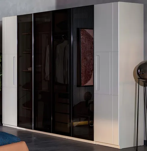 Designer Kleiderschrank mit Spiegeltüren – Weißer Holzschrank - Moderner Kleiderschrank mit 6 Türen und verspiegelten Fronten. Ideal für das Schlafzimmer, bietet viel Stauraum und stilvolles Design. Maße: 300 x 61 x 230 cm.