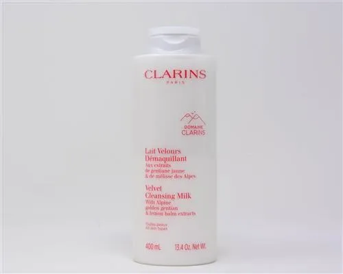 Clarins Velvet Cleansing Milk 400 ml - Gesichtsreinigung: Sanfte Reinigungsmilch für gründliche Make-up-Entfernung, mit wertvollen Inhaltsstoffen für ein strahlendes Hautbild.