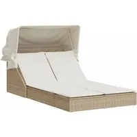 vidaXL Doppel-Sonnenliege mit Dach und Auflagen Beige - Bequeme Doppelliege aus robustem PE-Rattan mit verstellbarer Rückenlehne und ausziehbarem Sonnendach. Ideal für entspannte Stunden im Garten. Pflegeleichte Kissen mit waschbarem Bezug sorgen für zusätzlichen Komfort.