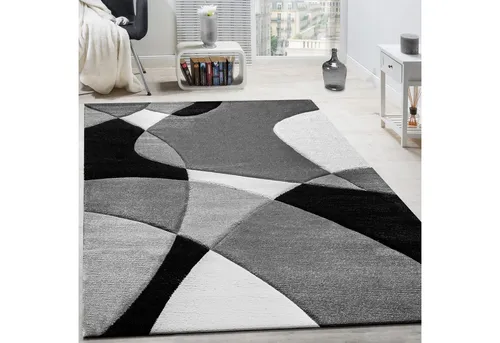 Kadima Design Teppich Schwarz 80x150 cm – Abstrakt, Stilvoll und Robust - Robuster Kurzflor Teppich in Schwarz, ideal für Wohnzimmer und Kinderzimmer. Mit handgefertigten Konturen sorgt er für eine wärmende Unterlage und bringt frischen Wind in jeden Raum. Schadstoffgeprüfte Materialien für höchste Qualität.
