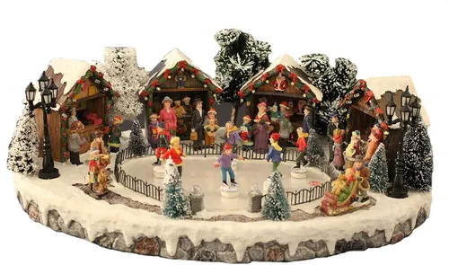 Weihnachtliche Winterszene Eisläufer mit Licht und Musik