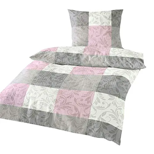 Traumschlaf Seersucker Sommer Bettwäsche in Rose - Bettwäsche-Set aus 100 % Baumwolle mit romantischem Blumenmuster, atmungsaktiv und bügelfrei – ideal für kühle Nächte im Sommer.