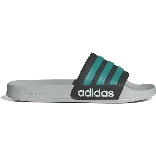adidas Adilette Shower Sandalen UK 7 | EU 40,5 grau - Klassische Wassersandalen aus schnelltrocknendem Material, ideal für Freizeit und Wassersport. Entdecken Sie weitere Top-Angebote von adidas im Online-Shop!
