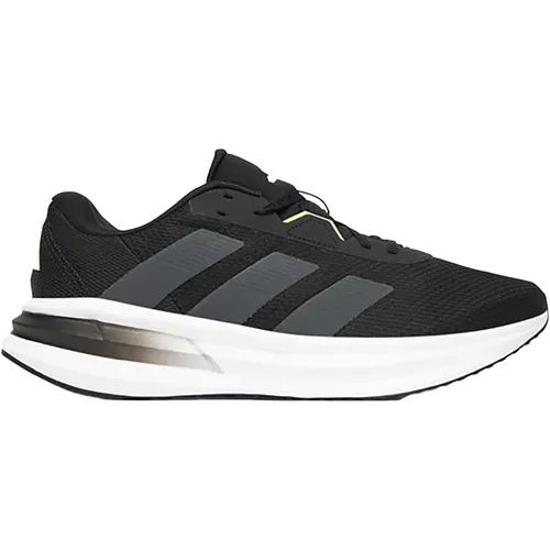 Adidas GALAXY 7 - Schwarze Sportschuhe für Herren - Bequeme und stylische Adidas GALAXY 7 Sportschuhe in Schwarz, ideal für das Training und den Alltag. Optimaler Komfort und modernes Design für jeden Schritt.