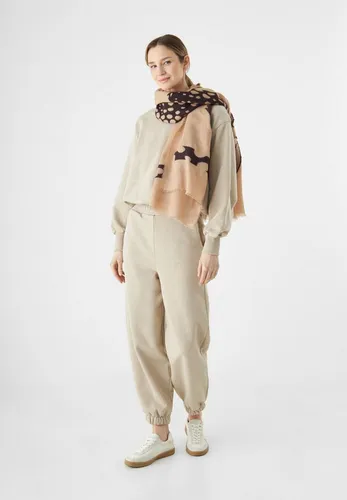 Codello Modeschal, Luxuriöser Glanz in Beige - Eleganter Modeschal in Onesize, aus hochwertiger Baumwollmischung für einen angenehmen Tragekomfort. Ideal für vielseitige Styles und jeden Anlass.