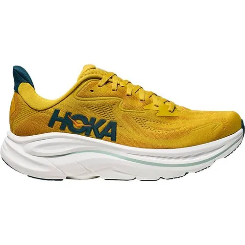 Hoka One One Clifton 10 Herren Gelb/Gold 44 - Der Hoka One One Clifton 10 für Herren kombiniert hervorragenden Komfort mit einer leistungsstarken Dämpfung, ideal für lange Läufe auf Asphalt. Vertraue auf Qualität und Stil.
