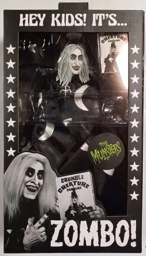 NECA - Rob Zombie's Munsters Zombo-Actionfigur, 20,3 cm - Actionfigur aus Rob Zombie's The Munsters, 20,3 cm groß, voll beweglich mit maßgeschneiderter Stoffkleidung und Zubehör, ideal für Sammler und Kinder.