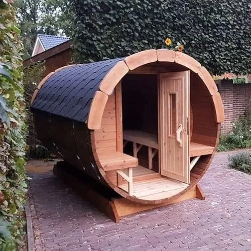 Fasshütte Wellnessfass – Holzfass Sauna für Garten - Geräumige Gartensauna für bis zu 8 Personen, gefertigt aus hochwertigem Holz. Mit einer elektrischen Heizung für angenehme Wärme. Ideal für entspannende Stunden im Freien.