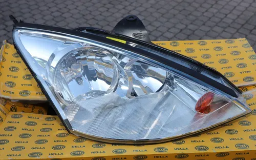 HELLA Hauptscheinwerfer 1EE 010 198-021 für FORD DNW DBW DFW FOCUS P21W DAW 12V