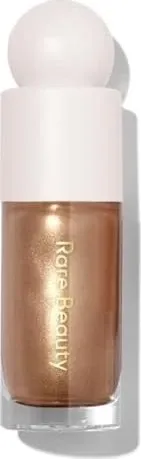 Rare Beauty Positive Light Liquid Luminizer (Reflect) - Make-up Highlighter mit sofortiger Strahlkraft und langanhaltendem, sanften Glanz. Die gewichtlose Formel ist für alle Hauttöne geeignet und sorgt für ein strahlendes Finish.