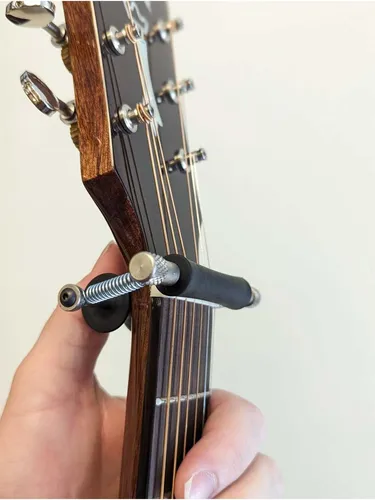 Glider GLX1 Kapodaster - Handgefertigter Kapodaster aus den USA, der Ihre Gitarre schont und sich nahtlos anpasst. Ideal für Musiker, die Wert auf Qualität und Funktionalität legen.