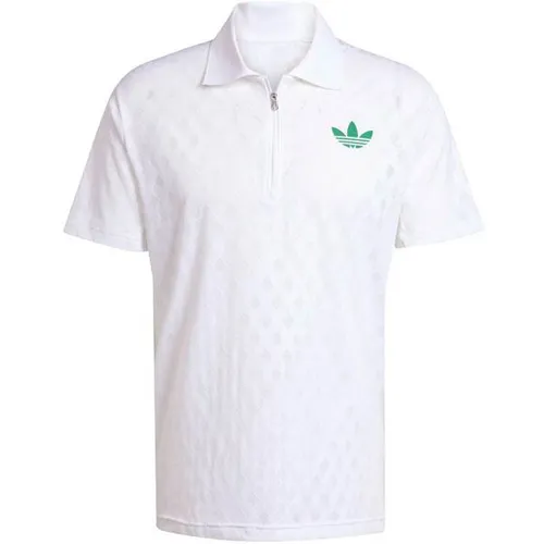 ADIDAS Herren Polo Tennis Pro Climacool+ FreeLift - Hochwertiges Poloshirt für Tennis, ausgestattet mit CLIMACOOL+ für optimales Feuchtigkeitsmanagement. Die FreeLift Passform sorgt für Bewegungsfreiheit, während der klassische Polokragen und das Trefoil-Design Stil und Komfort vereinen.