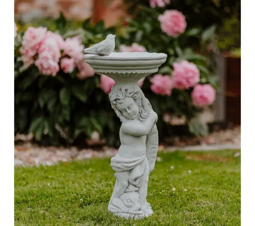 Gartenfigur Junge mit großer Vogeltränke - Figuren: Frostsichere Steinfigur (H. 54 cm, 18 kg) mit großer Vogeltränke, die gefiederten Freunden ein Zuhause bietet.