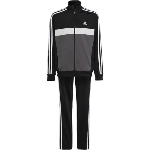 ADIDAS Kinder Sportanzug Essentials 3-Streifen Tiberio - Trainingsanzug für Kinder, ausgestattet mit AEROREADY Technologie für ein trockenes Tragegefühl und aus 100 % recycelten Materialien gefertigt.