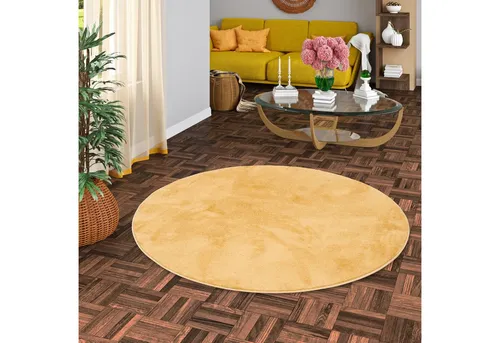 Snapstyle Luxus Teppich Currygelb, Rund, 100x100 cm - Der Snapstyle Luxus Teppich in Currygelb bringt Wärme und Stil in jeden Raum. Mit rutschfester Unterseite und hoher Strapazierfähigkeit bietet er Komfort und Sicherheit, ideal für Familien. Genießen Sie luxuriöse Eleganz unter Ihren Füßen!