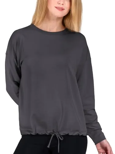 Magadi Sweatshirt Gigi Dark Grey – Nachhaltig und Bequem - Der langarm Wohlfühl-Sweater GIGI von MAGADI bietet einen lässigen Oversized-Schnitt und Kordelzug für individuelle Weitenanpassung. Ideal für Yoga und Freizeit, aus weicher Bio-Baumwolle und TENCEL für hohen Tragekomfort.