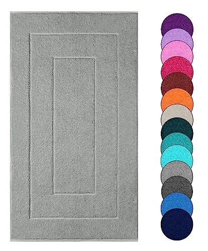 Lashuma London Saugfähige Duschmatte 50x90 cm in Stein Grau - Die weiche Duschmatte in Stein Grau ist nicht nur ein stilvolles Deko-Element, sondern auch äußerst saugfähig. Waschbar bei 60 Grad und aus 100% Baumwolle, sorgt sie für Komfort und Langlebigkeit in Ihrem Badezimmer.