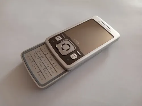 SONY ERICSSON T303 SILBER TOP+OVP+VIELE EXTRAS+RECHNUNG+DHL VERSAND