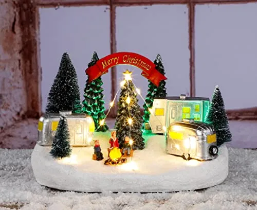 Spetebo LED Weihnachtsstadt Szene Merry Christmas - 26 cm - Weihnachtlicher Zierschmuck, beleuchtet mit 19 warm weißen LEDs, ideal für stimmungsvolle Tisch- oder Fensterdeko. Batteriebetrieben und perfekt für die festliche Jahreszeit.