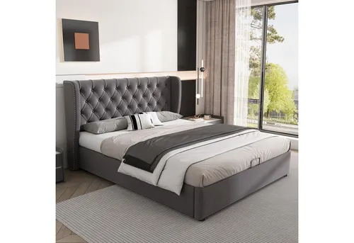 Stilvora Polsterbett Grau 140x190 cm mit Bettkasten - Kompaktes Polsterbett für effiziente Raumnutzung in Stadtwohnungen. Der integrierte Bettkasten bietet zusätzlichen Stauraum für Decken und Kissen, während die gepolsterte Lehne bequemes Sitzen ermöglicht. Zeitloses Design mit Samtbezug.