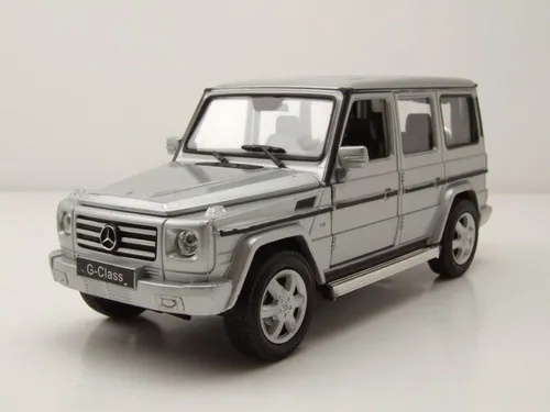 Mercedes G-Klasse 2009 Modellauto 1:24 Welly - Detailgetreues Modellauto der Mercedes G-Klasse in Weiß, mit OVP und beweglichen Teilen. Ideal für Sammler und Autofans!