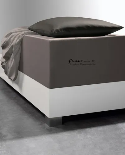 fleuresse 1119 XXL Jersey Stretch Spannbetttuch - Spannbetttuch aus 96% Baumwolle mit Rundumgummizug, ideal für Matratzen bis 40 cm Höhe. Atmungsaktiv, hautsympathisch und schadstoffgeprüft nach Ökotex-Standard 100 für erholsamen Schlaf.